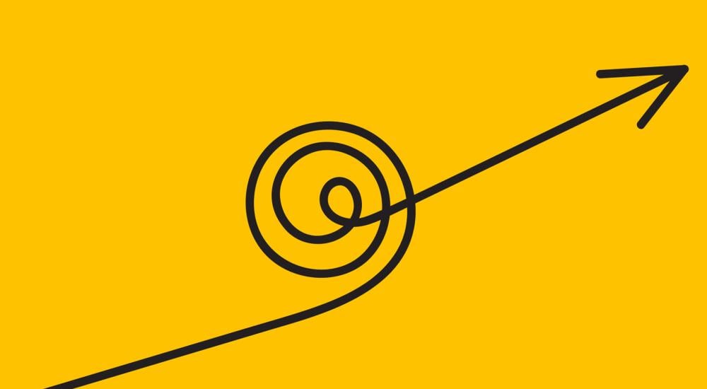 Black arrow on a yellow background