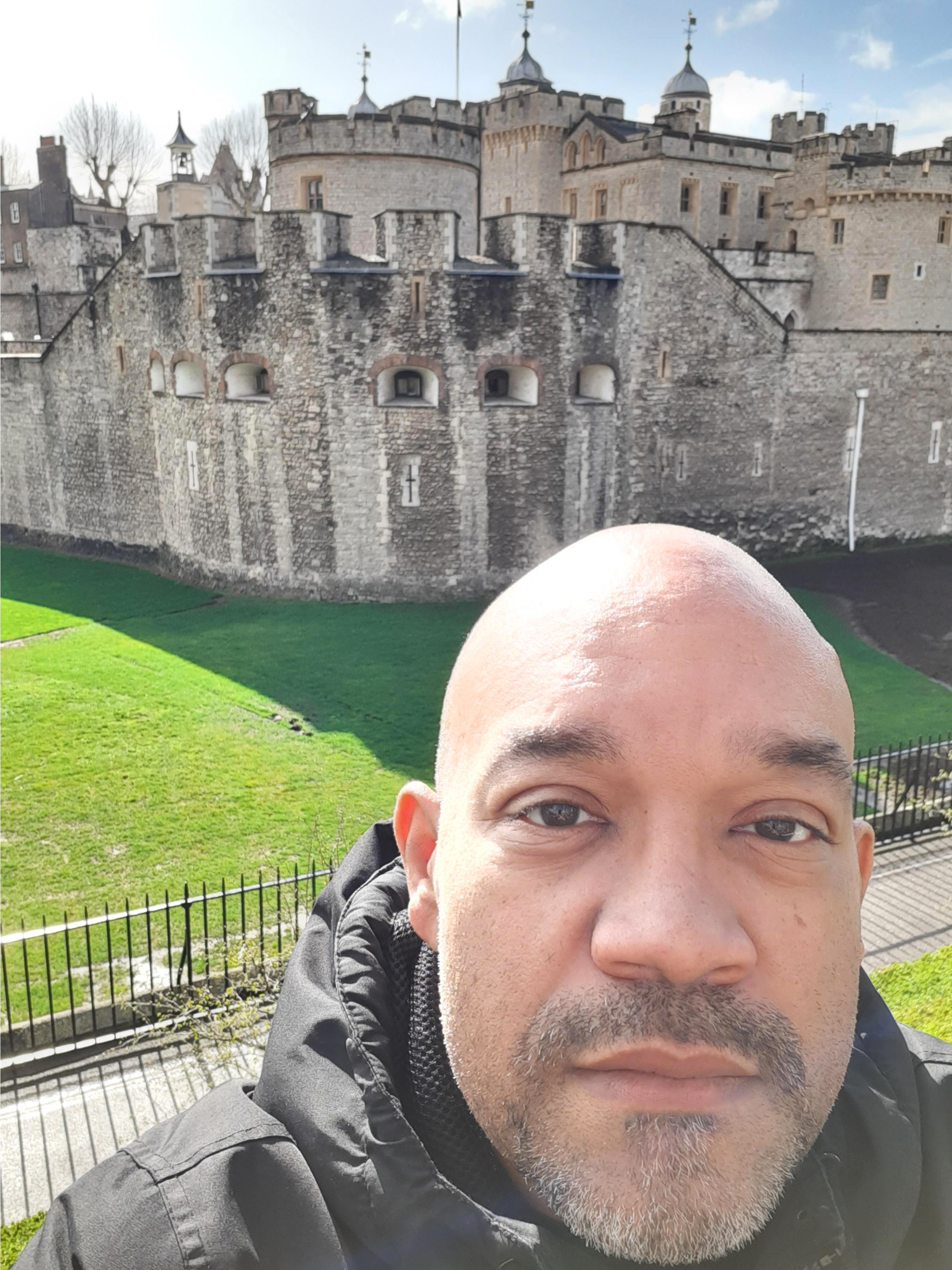 A student with a castle in the background