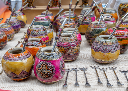 Colorful cups of mate at a street vendor
