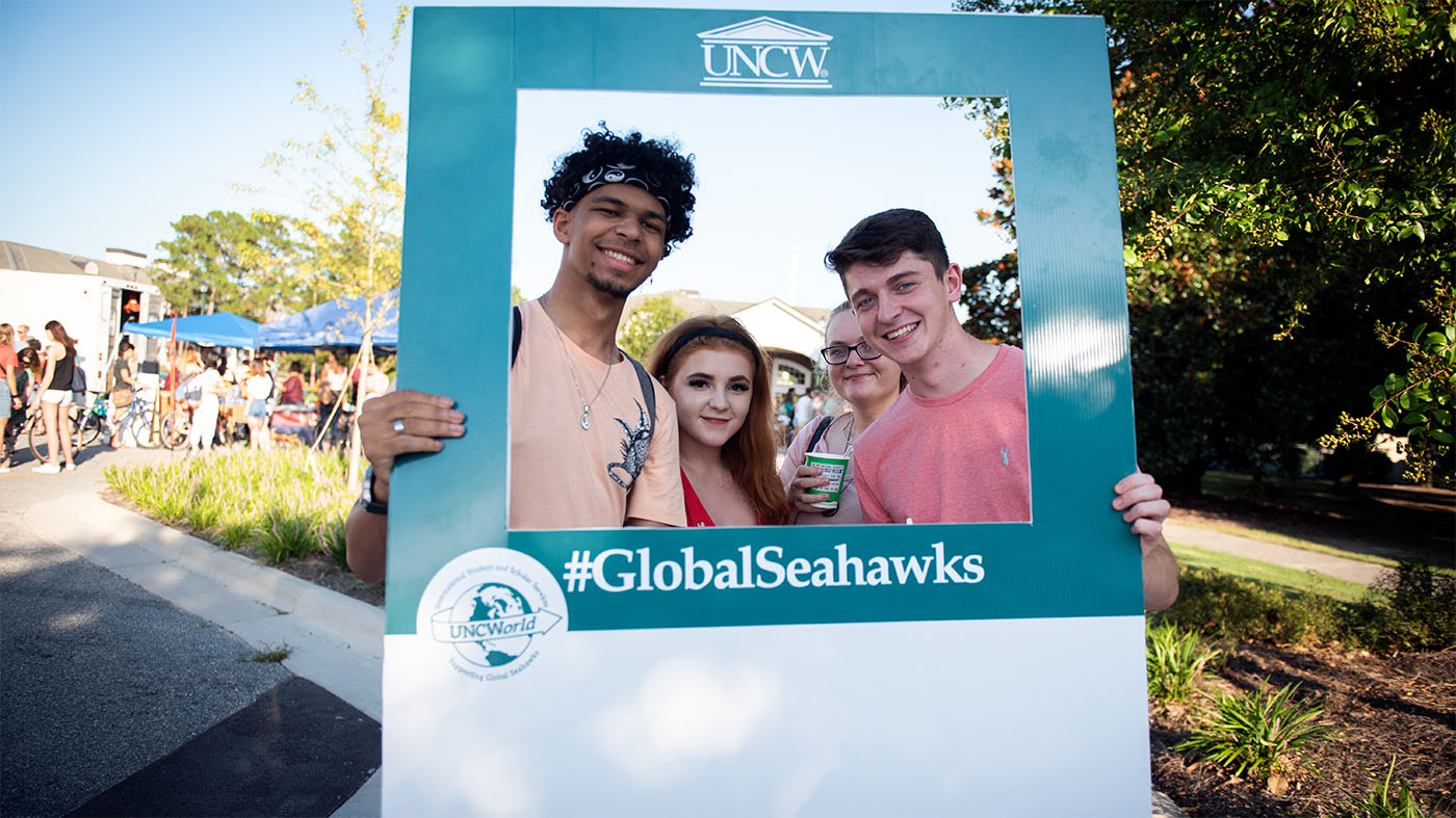 Students show their pride for UNCW study abroad