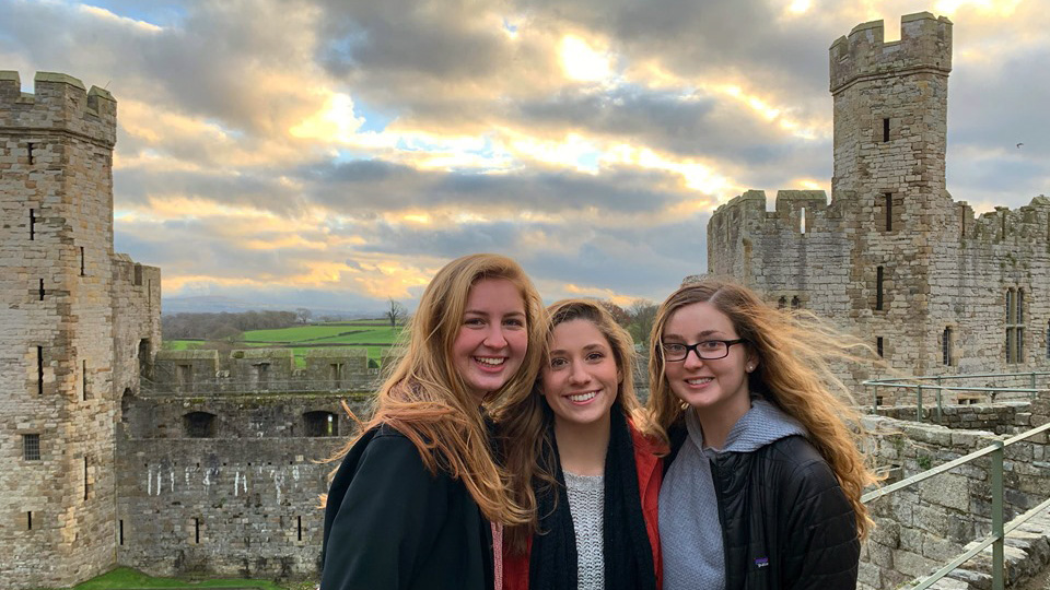 Students participating in the FYSA in the United Kingdom program in front of a Welsh castle