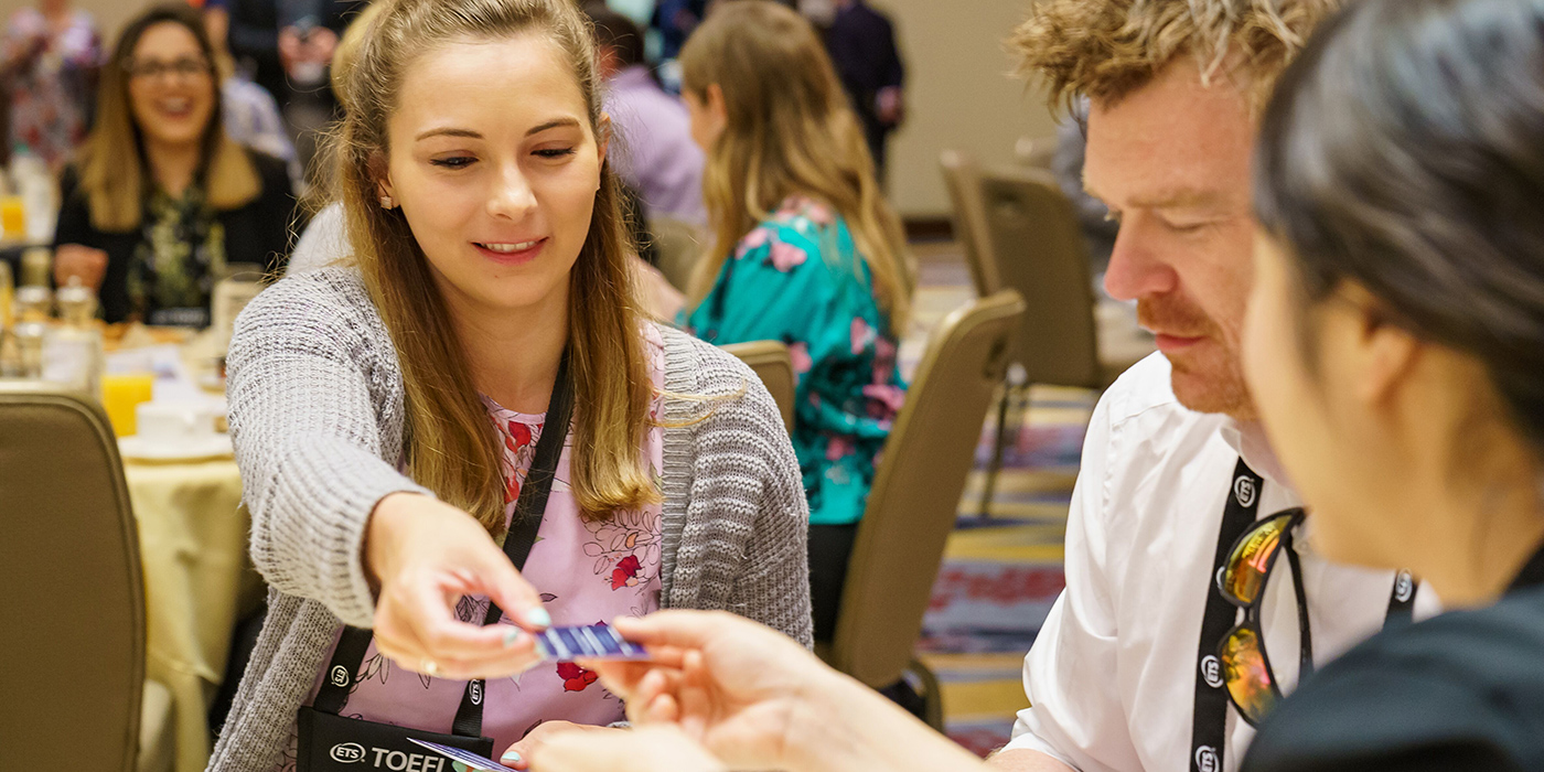 NAFSA attendees exchanging business cards