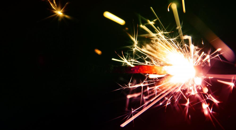 Colored sparks against a black background