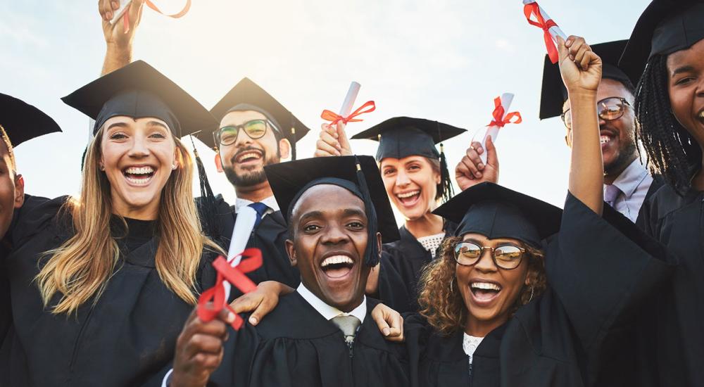 students in graduation caps and gowns