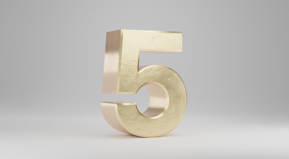 gold numeral five against grey background