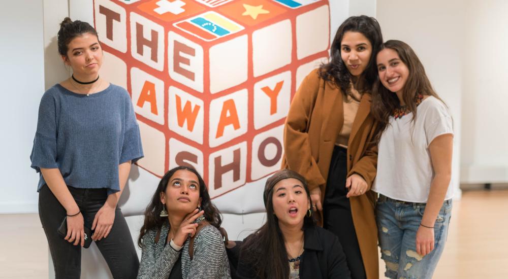 Students at an art show.