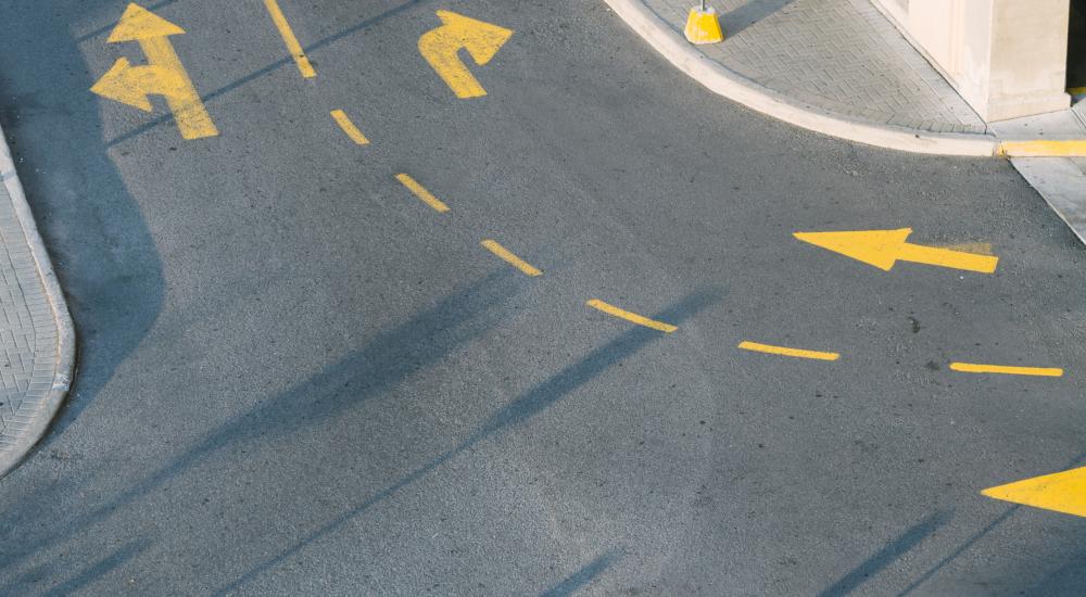 Road with yellow arrows