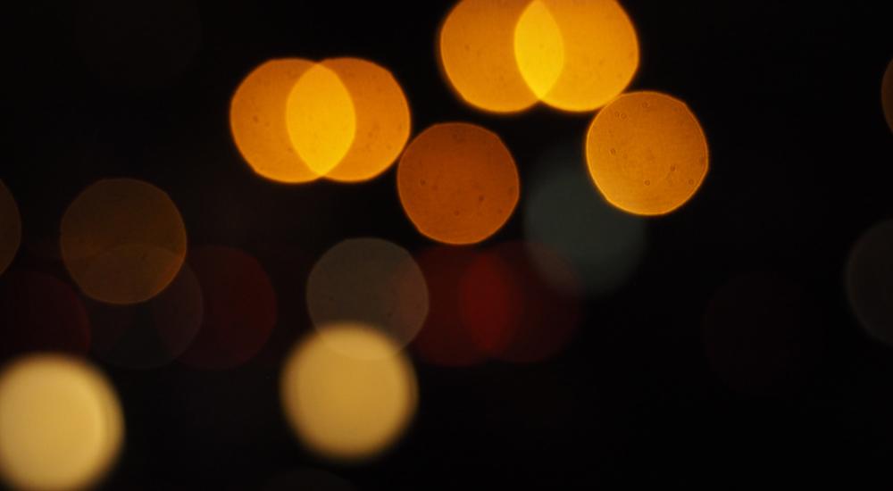 points of light in soft focus against dark background