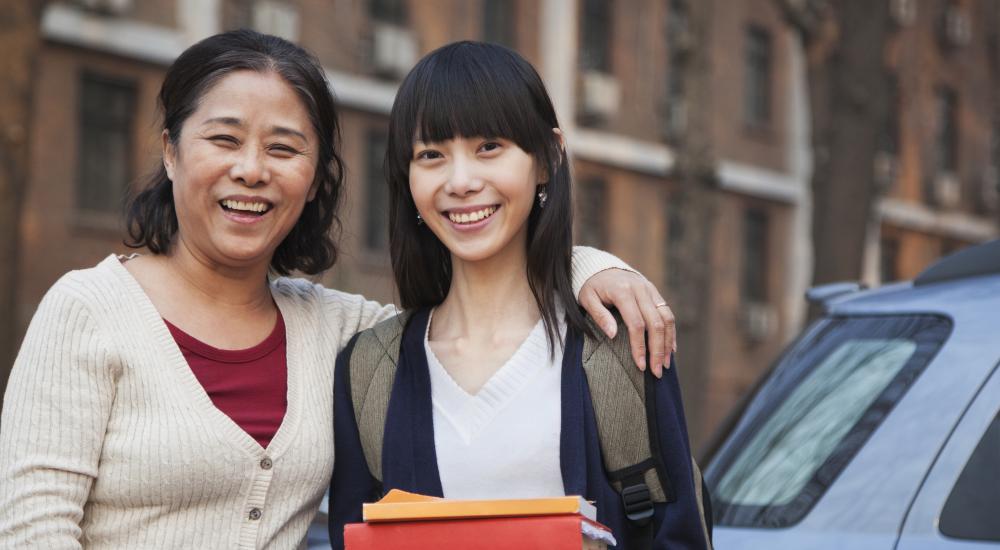 Photo of an international student and her parent