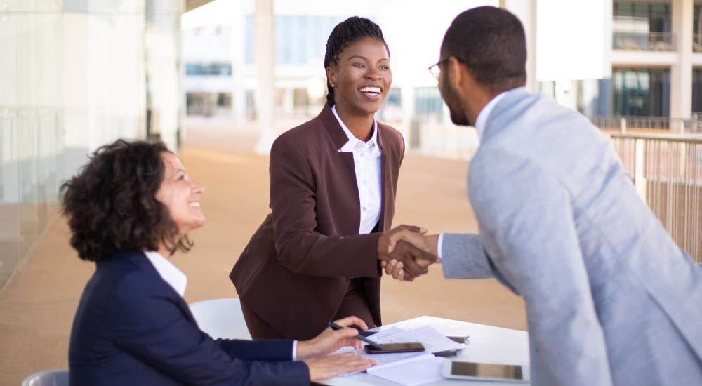 Photo of people shaking hands