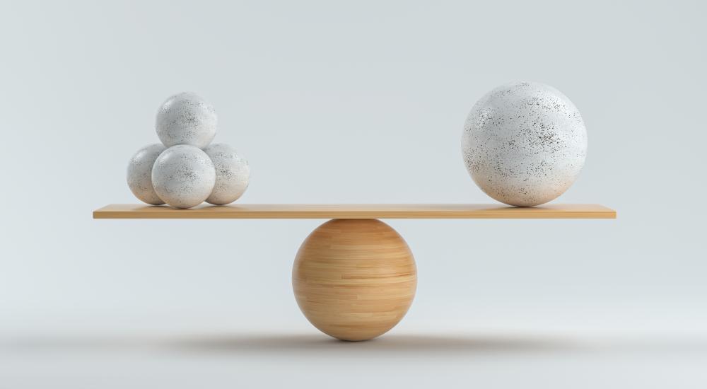 Photo of balancing balls on a board