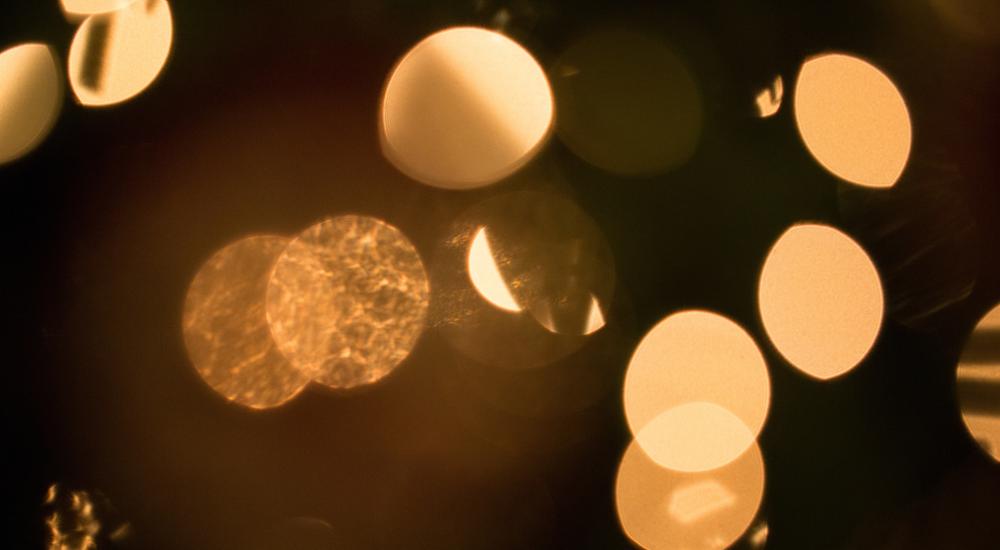 points of light in soft focus against dark background