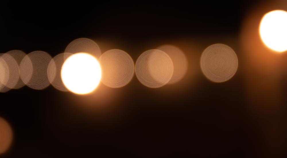 points of light in soft focus against dark background