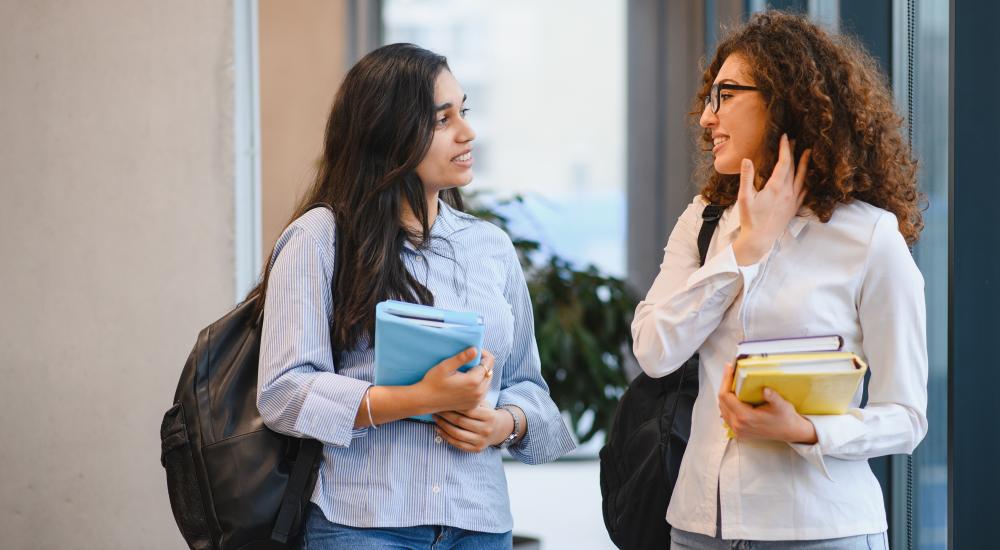 two women speaking