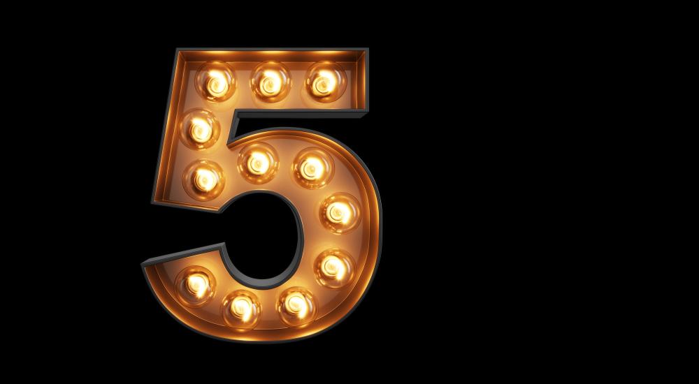 The number five in theater-style lights