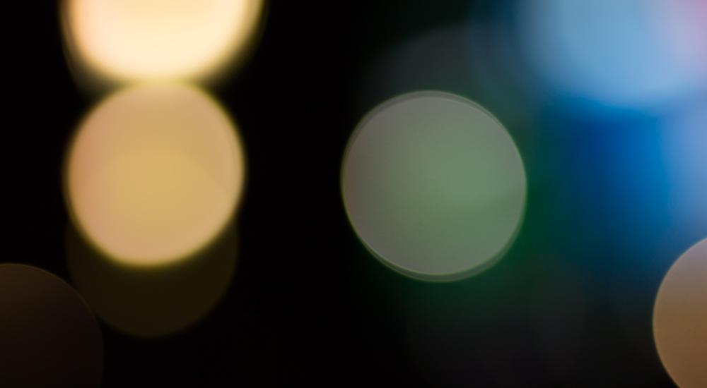 points of light in soft focus against dark background