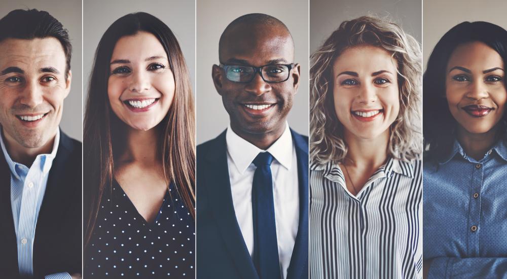 Headshots of five business people in a row