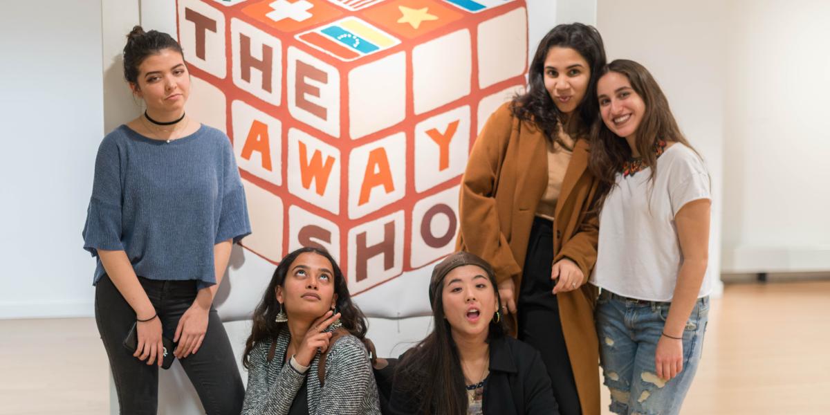 Students at an art show.