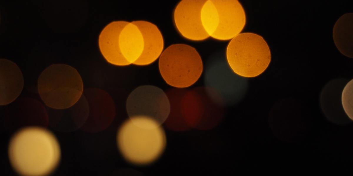 points of light in soft focus against dark background