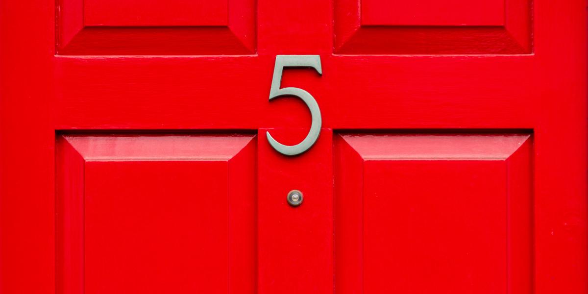 house number 5 on a red door
