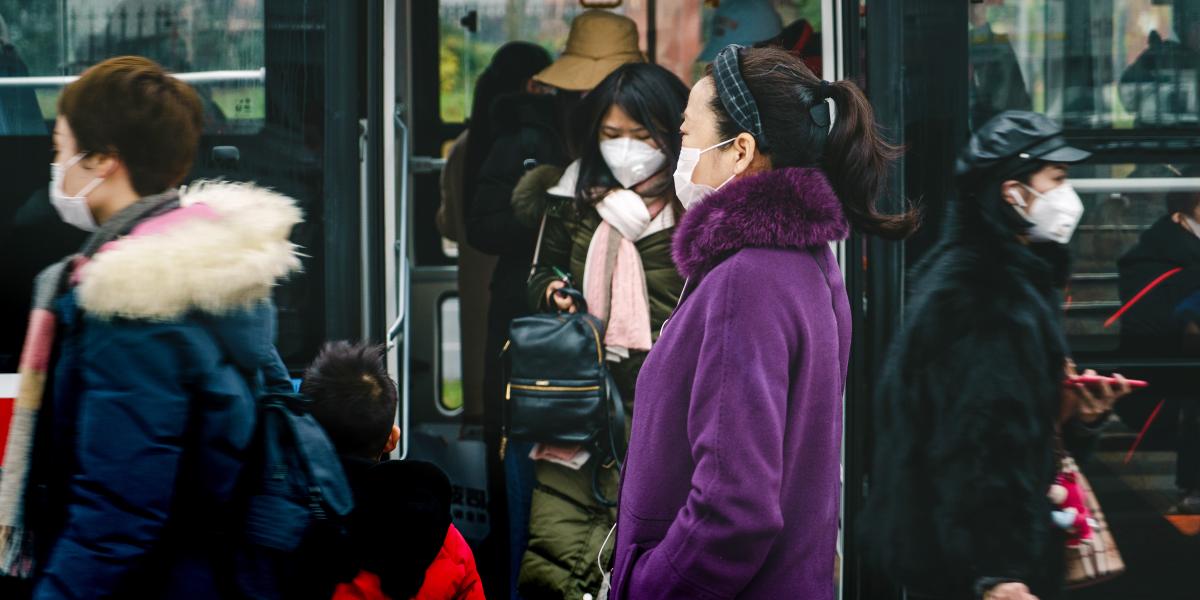 People in China wearing surgical masks