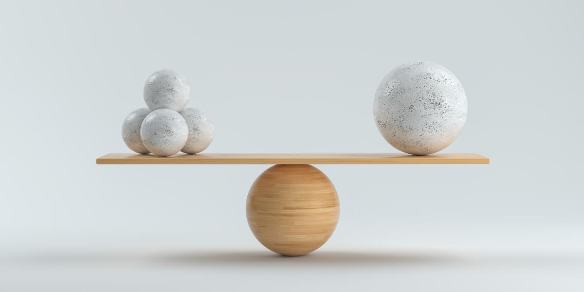 Photo of balancing balls on a board