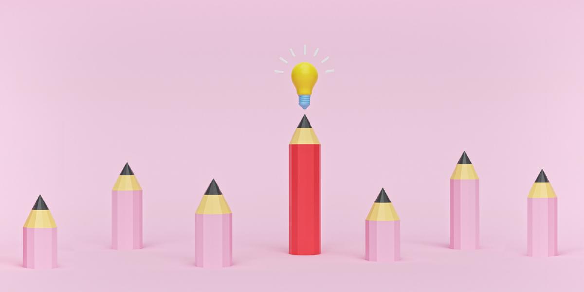 illustration of pink pencils with tall red pencil and light bulb