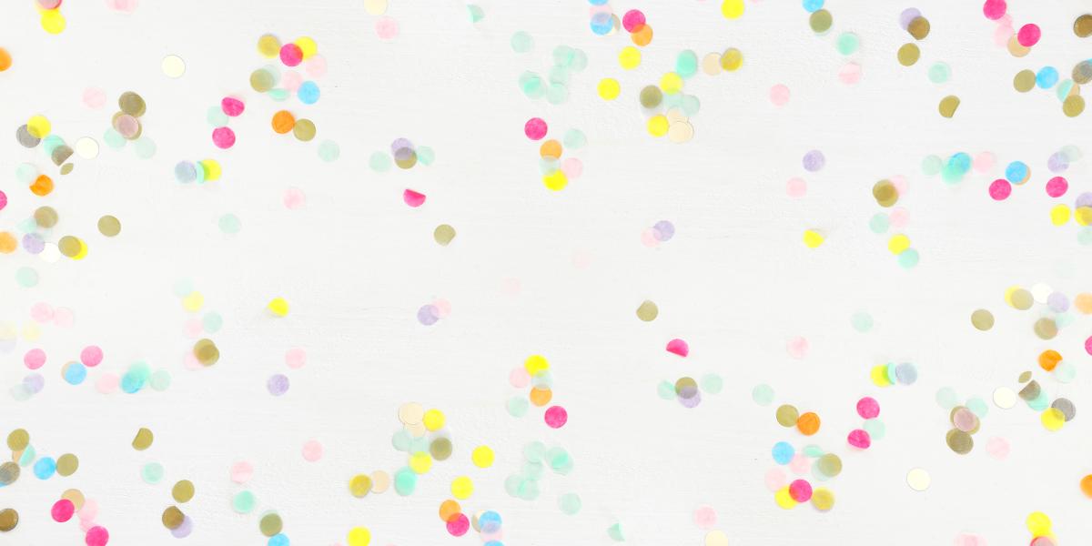 multicolor confetti on white background