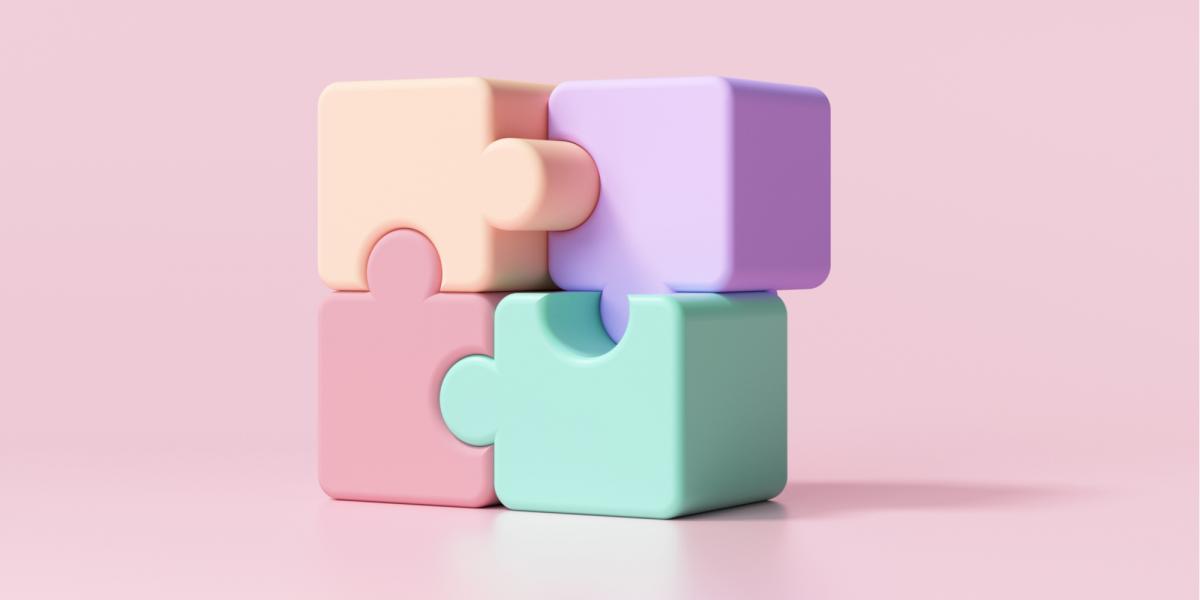 3D jigsaw puzzle pieces on pink background