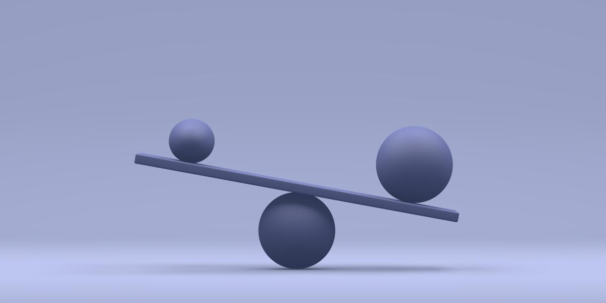 Image of two balls balancing on a board