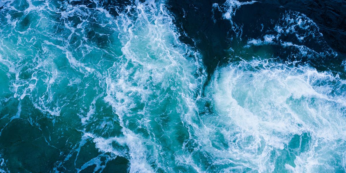 an overhead view of ocean waves