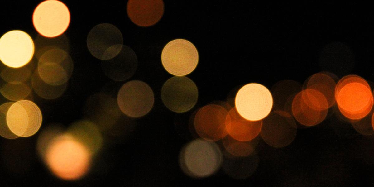 points of light in soft focus against dark background