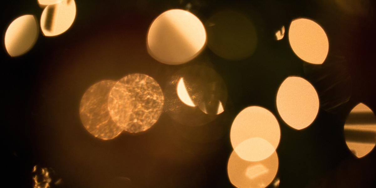 points of light in soft focus against dark background