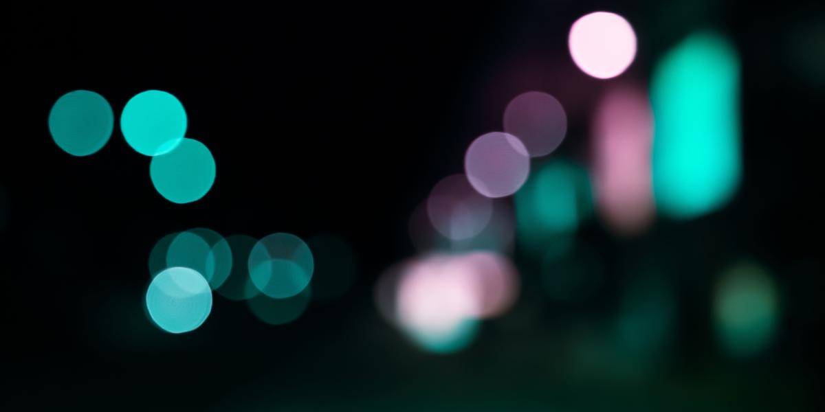 points of light in soft focus against dark background