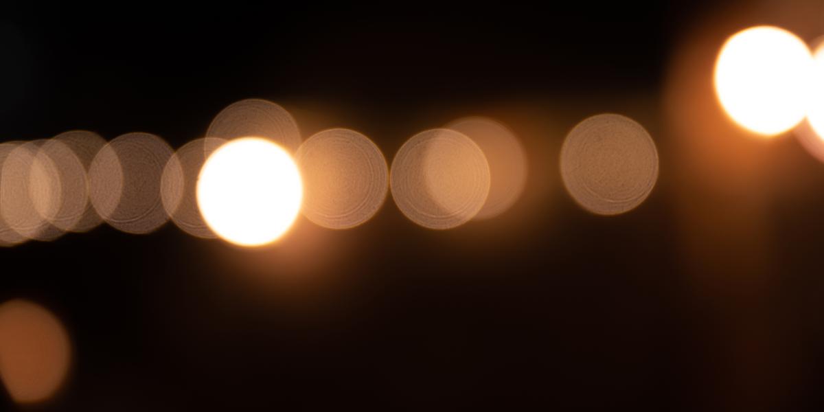 points of light in soft focus against dark background
