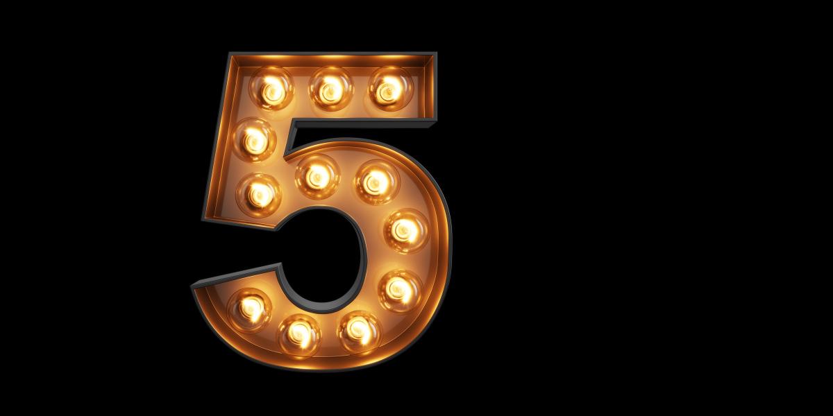 The number five in theater-style lights