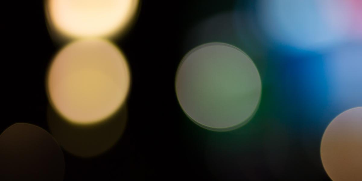 points of light in soft focus against dark background