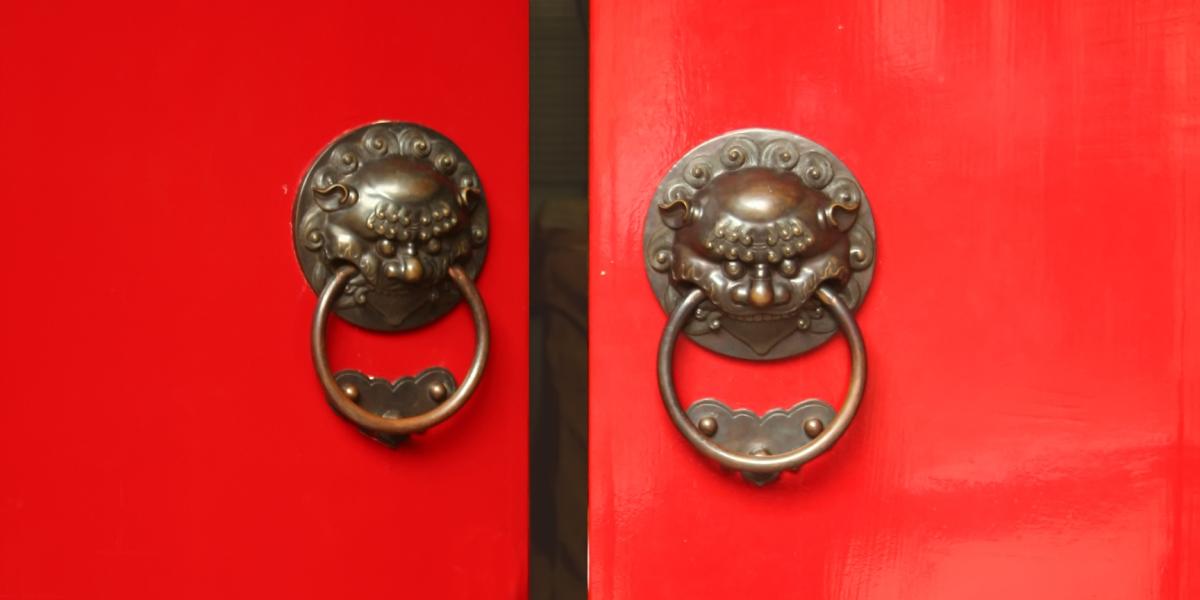 Pair of red doors slightly open