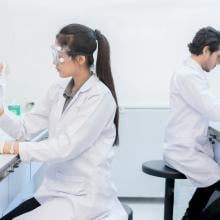 two scientists working in a lab