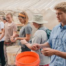students sort cocoa beans