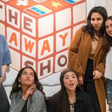 Students at an art show.