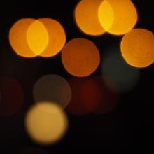 points of light in soft focus against dark background
