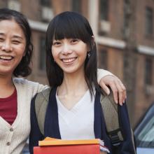 Photo of an international student and her parent