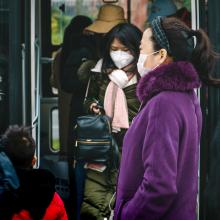 People in China wearing surgical masks