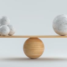 Photo of balancing balls on a board