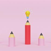 illustration of pink pencils with tall red pencil and light bulb