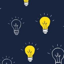 Illustration of yellow and clear lightbulbs on a navy background