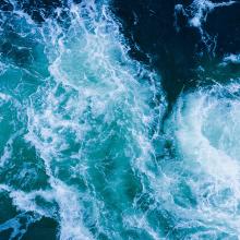 an overhead view of ocean waves