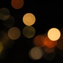 points of light in soft focus against dark background