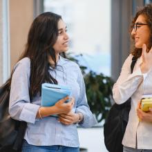 two women speaking